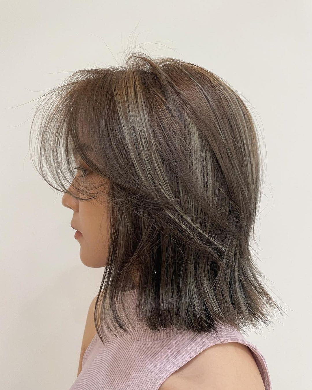 11. Raucher aschbrauner Bob mit weichen Schichten (geschichtete Bob -Frisuren)