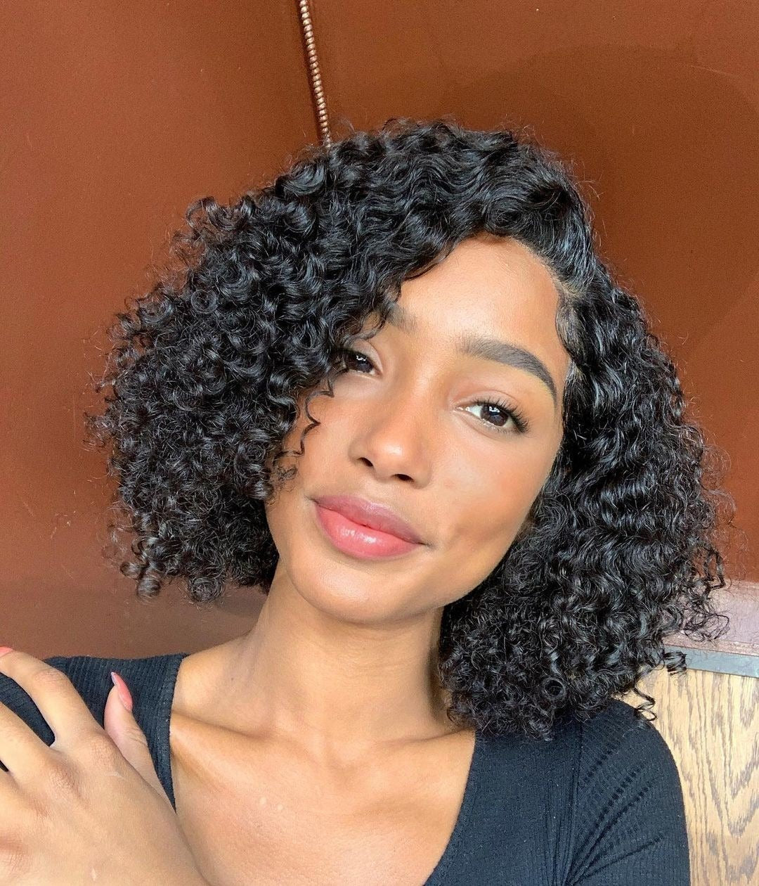 12. Defined Jet Black Side Parted Curly Bob (Curly Bob Frisuren)