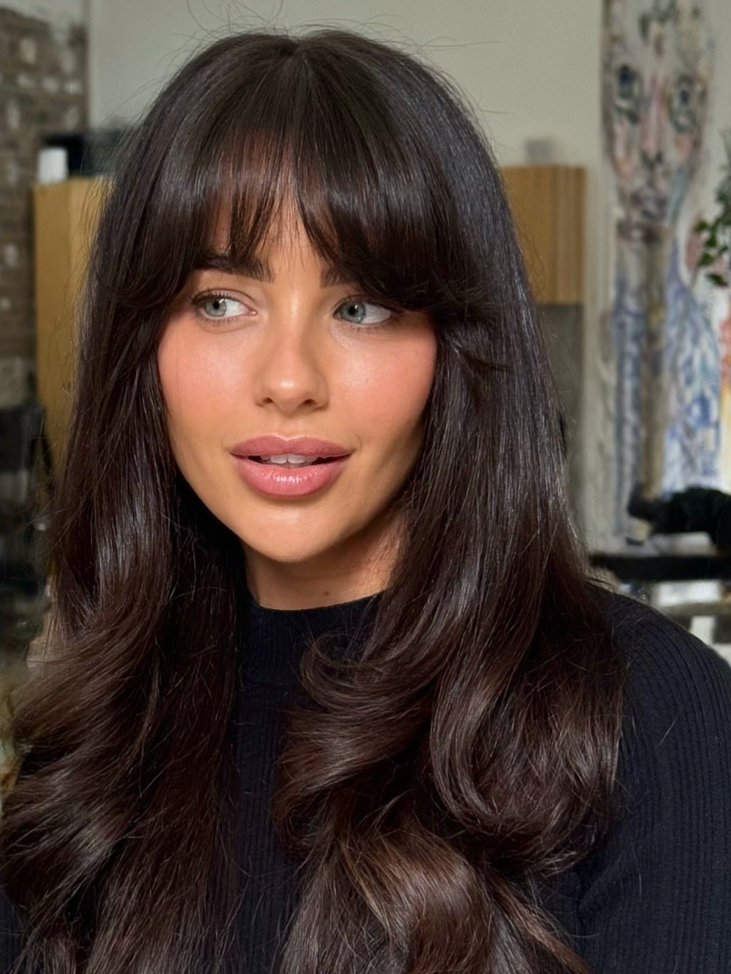 14. Polierte Schichten mit langer abgerundeter Fransen (Bangfrisuren)