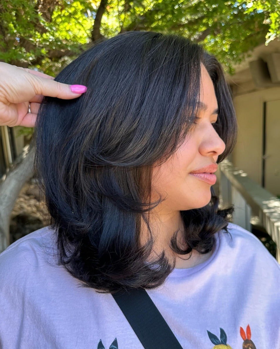 15. Schichtwellen mit weichem schwarzem Finish (kurze geschichtete Haarschnitte)