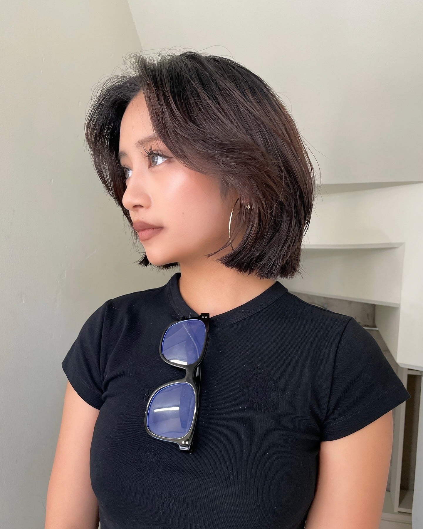 3. Sleek Schokoladenbraun, abgerundeter Bob (geschichtete Bob -Frisuren)