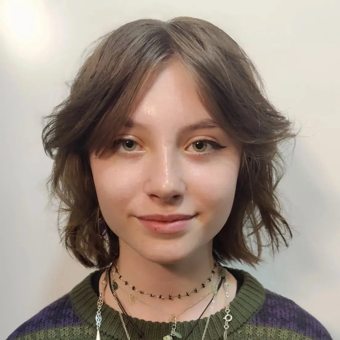 5. Federed Bob-Shag mit wispy Vorhangrand (kurze zottelige Haarschnitte)