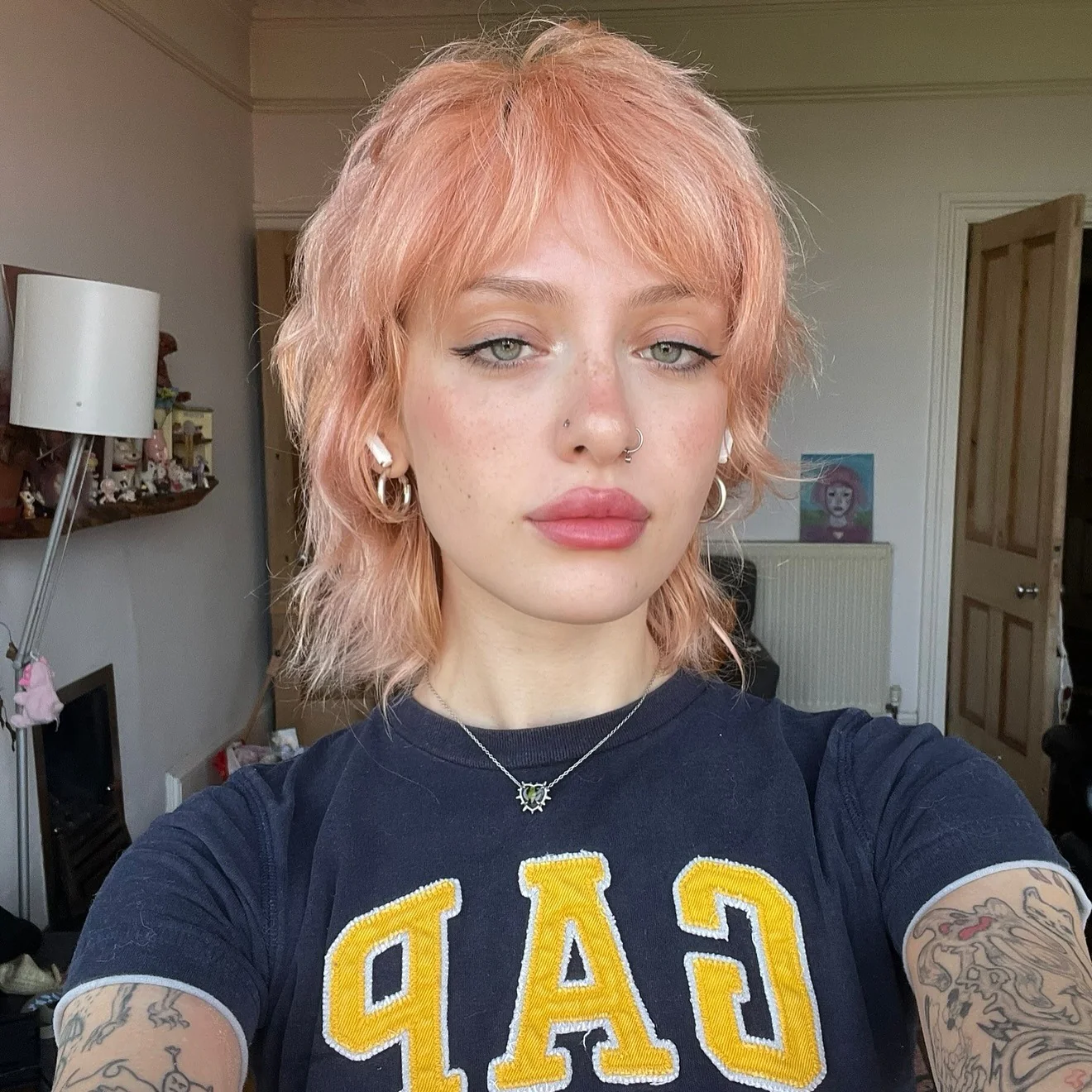 6. Peach Vokuhila Pixie mit geschichteter Textur (geschichtete Pixie-Frisuren)