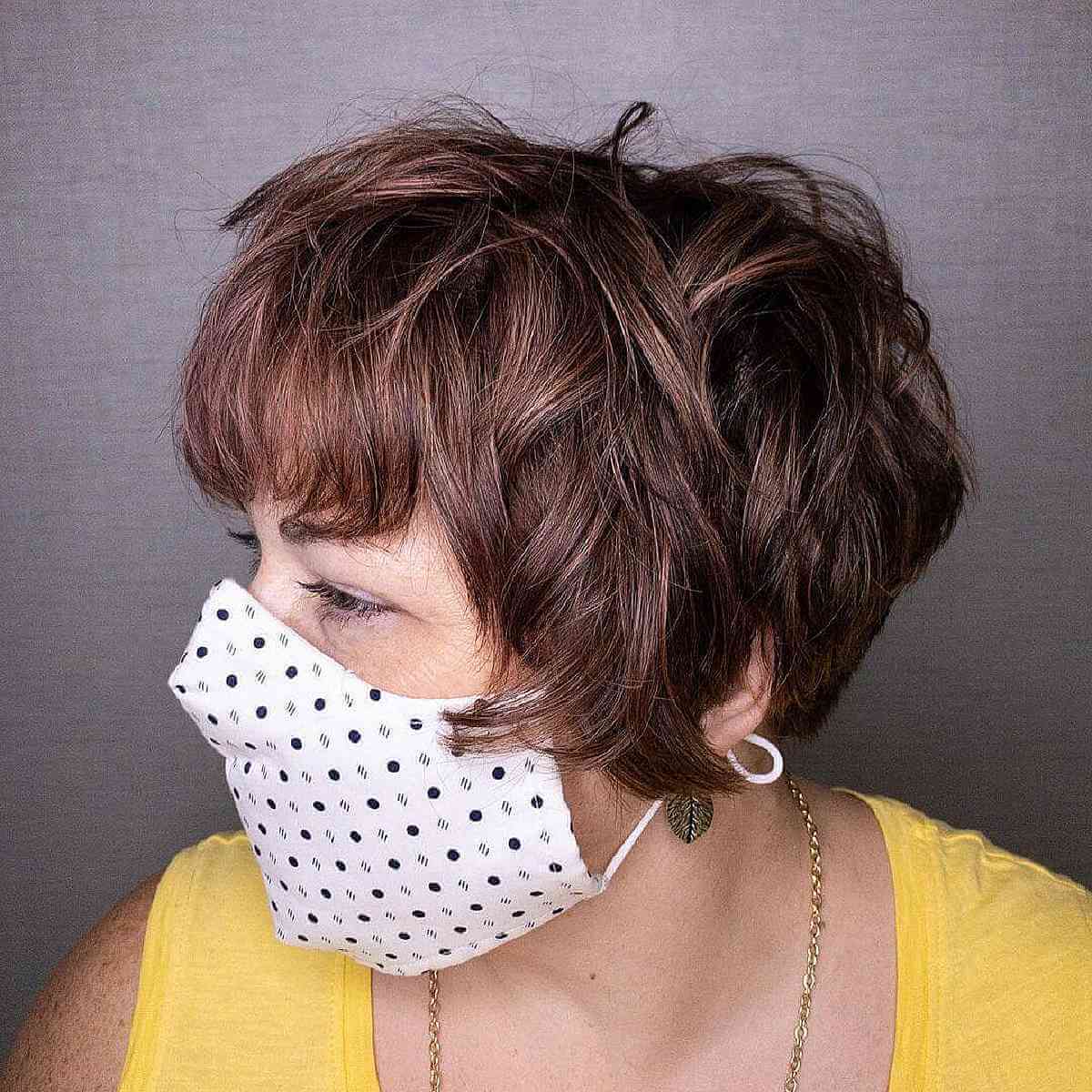 31 atemberaubende Pixie-Haarschnitte mit Pony für einen Gesichtsrammstil Shaggy -Pixie mit weichen Highlights für dickes Haar